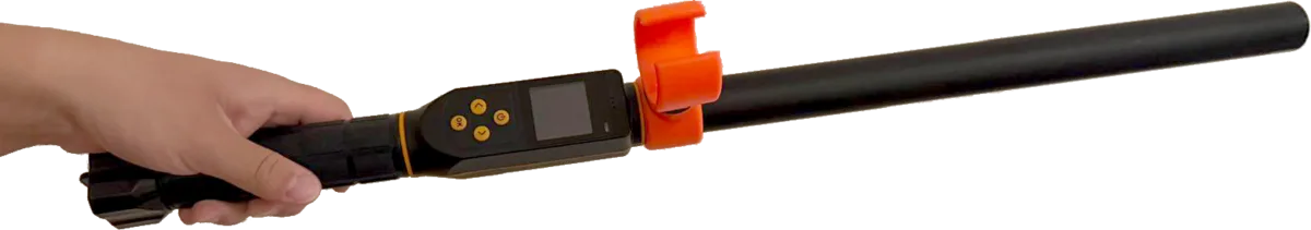Ani-Tech AT-01003 Dual-Frequency LF/UHF RFID Stick Reader, held in hand
